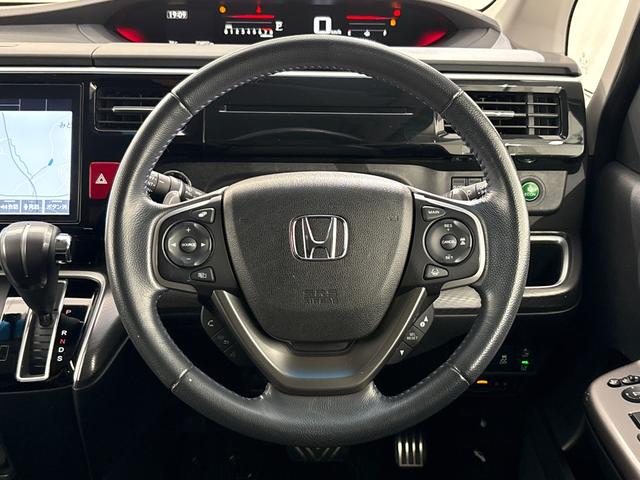 ステップワゴンスパーダ スパーダ・クールスピリットホンダセンシング 純正メモリーナビ/フルセグTV/バックカメラ/LEDヘッドライト/ETC2.0/両側パワースライドドア/リア席ルーフモニター/パドルシフト/スマートキー/前後ドラレコ/サイドカーテンエアバック 地TV(11枚目)