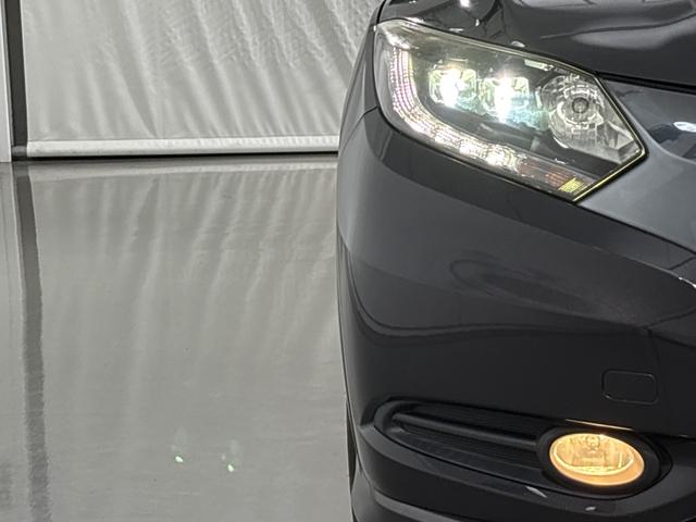 ヴェゼル ハイブリッドX /ワンオーナー/禁煙車/純正メモリーナビ/リアカメラ/LEDヘッドライト/ 純正16インチアルミホイール/前後ドラレコ/シートヒーター/CTBA/ メンテナンスノート キーレスエントリー リヤカメラ(2枚目)