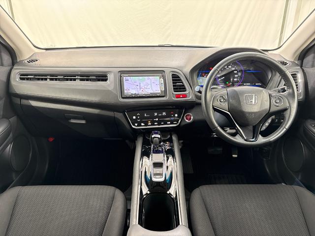 ヴェゼル ハイブリッドX /ワンオーナー/禁煙車/純正メモリーナビ/リアカメラ/LEDヘッドライト/ 純正16インチアルミホイール/前後ドラレコ/シートヒーター/CTBA/ メンテナンスノート キーレスエントリー リヤカメラ(9枚目)