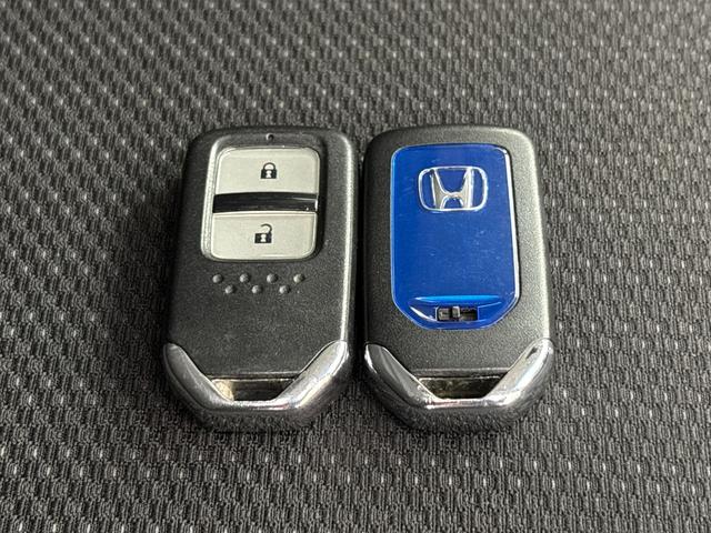 ヴェゼル ハイブリッドX /ワンオーナー/禁煙車/純正メモリーナビ/リアカメラ/LEDヘッドライト/ 純正16インチアルミホイール/前後ドラレコ/シートヒーター/CTBA/ メンテナンスノート キーレスエントリー リヤカメラ(21枚目)