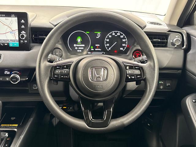 ヴェゼル ｅ：ＨＥＶＸ　純正メモリーナビ　フルセグＴＶ　バックカメラ　前後ドラレコ　ＬＥＤヘッドライト　ＥＴＣ２．０　横滑り防止装置　ホンダセンシング　パドルシフト　ワイヤレス充電器　前後障害物センサー　ＡＡＣ　スマ－トキ－（11枚目）