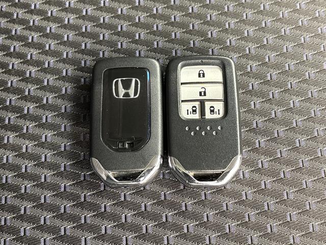 ステップワゴンスパーダ スパーダホンダセンシング 7人/禁煙車/リア席モニター/メモリナビVXM-175VFi/ホンダセンシング/フルセグTV/BTA/リアカメラ/ETC/LEDライト/スマートキー/両側電動スライドドア/純正16AW/カーテンAB/(21枚目)