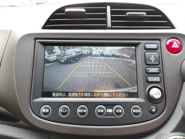 フィットシャトルハイブリッド ハイブリッド・ナビプレミアムセレクション　禁煙車純正ＨＤＤナビリヤカメラドアバイザーＥＴＣ　ＥＣＯＮ　Ｂカメラ　ハーフレザーシート　セキュリティーアラーム　クルーズコントロール　オートエアコン　ＤＶＤ　パワーステアリング　ワンセグ　エアバック（3枚目）