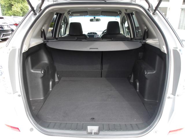 フィットシャトルハイブリッド ハイブリッド・ナビプレミアムセレクション　禁煙車純正ＨＤＤナビリヤカメラドアバイザーＥＴＣ　ＥＣＯＮ　Ｂカメラ　ハーフレザーシート　セキュリティーアラーム　クルーズコントロール　オートエアコン　ＤＶＤ　パワーステアリング　ワンセグ　エアバック（24枚目）