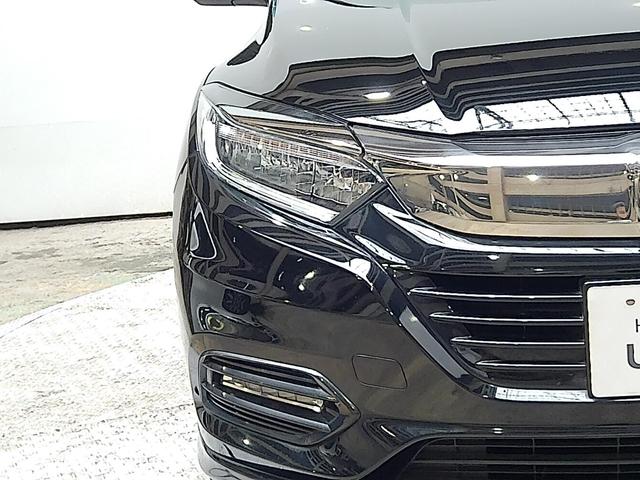 ヴェゼル ハイブリッドＺ・ホンダセンシング　ＨｏｎｄａＳＥＮＳＩＮＧ　ドラレコ　メモリーナビ　リアカメラ　４ＷＤ　ドアバイザー　ワンオーナー　ブルートゥースオーディオ　ミュージックプレイヤー接続可　禁煙　整備記録簿　横滑防止装置　ＬＥＤライト（24枚目）