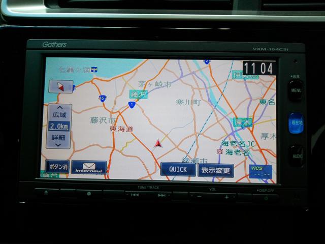 フィット 13G・Fパッケージ メモリーナビ リアカメラ ワンセグTV BT ETC CTBA ドアバイザー イモビ スマ-トキ- サイドエアバッグ 記録簿有り VSA ETC付き 禁煙 助手席エアバッグ Rカメラ オートエアコン(3枚目)