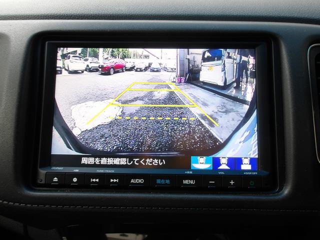 ヴェゼル ハイブリッドZ・ホンダセンシング 8インチナビ Rカメラ 前後ドラレコ ETC シートヒーター サイドカーテンエアバック レーダーサポート DVD再生機能 整備記録簿 横滑り防止システム バックアイカメラ 盗難防止装置 フルセ 禁煙(3枚目)