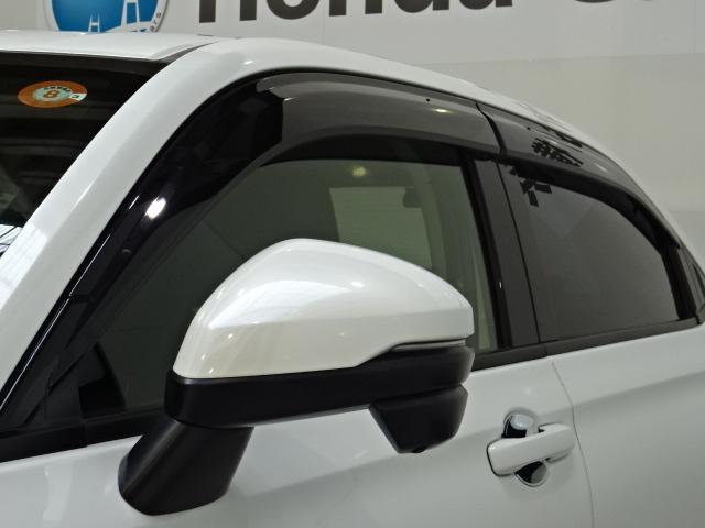 ヴェゼル e:HEVZ HondaSENSING 前後ドラレコ メモリーナビ 全周囲カメラ シートヒーター BSI ETC パドルシフト ドアバイザー ワンオーナー 衝突回避支援ブレーキ機能 パノラミックビューモニター 禁煙(26枚目)