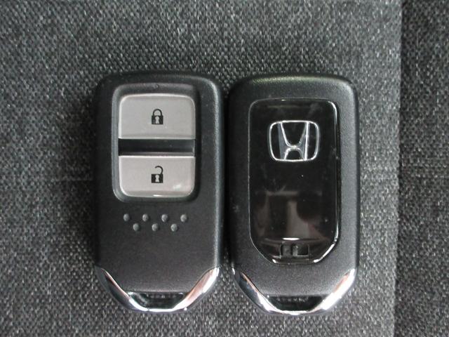 フィット e:HEVホーム20周年特別仕様車カーサ HondaSENSING 前後ドラレコ メモリーナビ リアカメラ シートヒーター ETC 純正アルミ Bluetooth ドアバイザー ワンオーナー LKAS BT接続 電動格納ミラー 横滑り防止装置(15枚目)