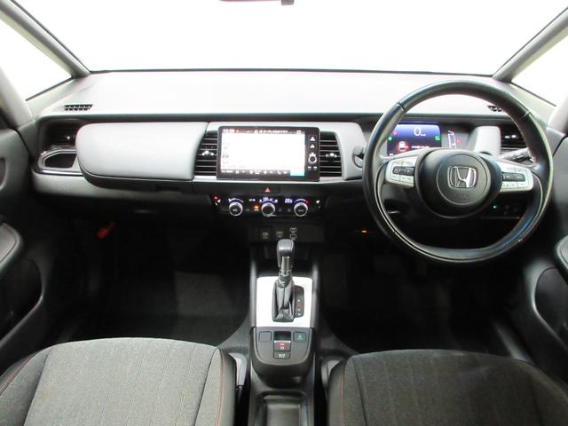 フィット e:HEVホーム20周年特別仕様車カーサ HondaSENSING 前後ドラレコ メモリーナビ リアカメラ シートヒーター ETC 純正アルミ Bluetooth ドアバイザー ワンオーナー LKAS BT接続 電動格納ミラー 横滑り防止装置(16枚目)