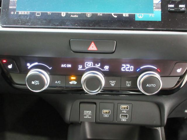 フィット e:HEVホーム20周年特別仕様車カーサ HondaSENSING 前後ドラレコ メモリーナビ リアカメラ シートヒーター ETC 純正アルミ Bluetooth ドアバイザー ワンオーナー LKAS BT接続 電動格納ミラー 横滑り防止装置(18枚目)