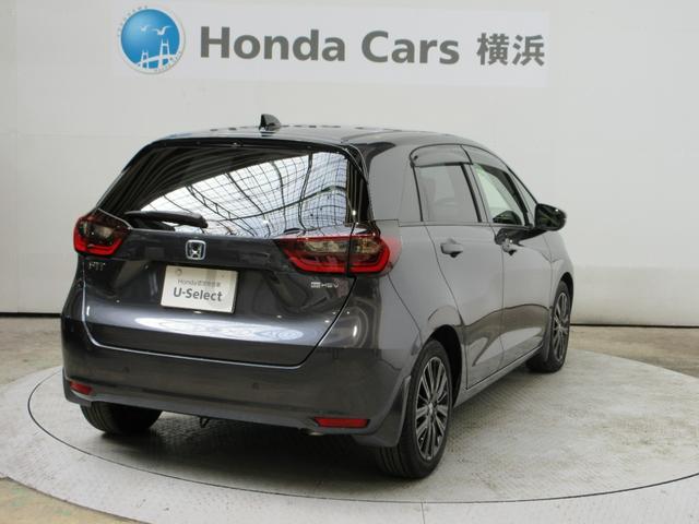 フィット e:HEVホーム20周年特別仕様車カーサ HondaSENSING 前後ドラレコ メモリーナビ リアカメラ シートヒーター ETC 純正アルミ Bluetooth ドアバイザー ワンオーナー LKAS BT接続 電動格納ミラー 横滑り防止装置(24枚目)