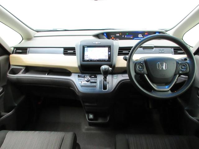 フリード G・ホンダセンシング 6人 メモリーナビ リアカメラ 両側電動スライドドア フルセグTV Bluetooth USB ETC ワンオーナー Fセグ 追突被害軽減ブレーキ 電格ドアミラー Wエアバッグ パワーウィンドウ 禁煙(12枚目)