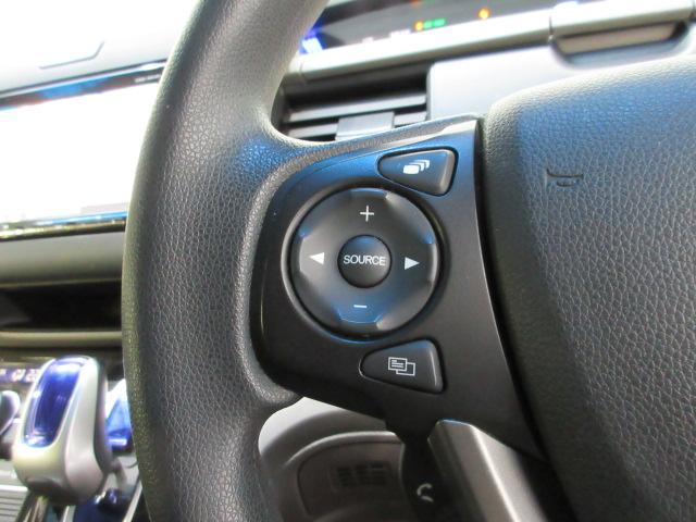 フリードハイブリッド ハイブリッド・Ｇホンダセンシング　６人　メモリーナビ　リアカメラ　両側電動スライドドア　ＥＴＣ　ＬＥＤライト　オートライト　Ｂｌｕｅｔｏｏｔｈ　ドアバイザー　ワンオーナー　軽減ブレーキ　キーフリーシステム　電動格納式ドアミラー　記録簿（6枚目）