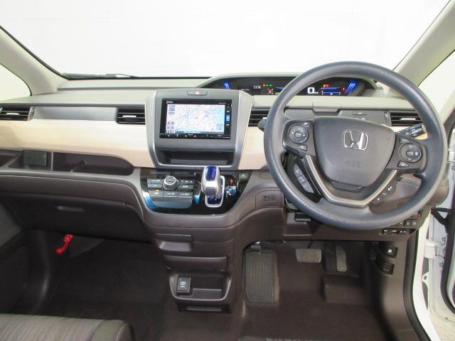 フリードハイブリッド ハイブリッド・Gホンダセンシング 6人 HondaSENSING ETC メモリーナビ リアカメラ フルセグTV Bluetooth ワンオーナー 軽減ブレーキ キーフリーシステム 電動格納式ドアミラー ミュージックプレイヤー接続可(12枚目)