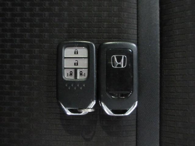 ステップワゴンスパーダ スパーダホンダセンシング 8人乗り ドラレコ メモリーナビ リアカメラ 後席モニター 両側電動スライドドア ETC2.0 Bluetooth パドルシフトワンオーナー 禁煙 LKA 盗難防止 助手席エアバッグ ワンオーナ-(21枚目)