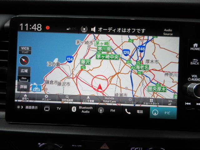 フィット ｅ：ＨＥＶクロスター　前後ドラレコ　ＥＴＣ　メモリーナビ　リアカメラ　ＨｏｎｄａＳＥＮＳＩＮＧ　パーキングセンサー　ワンオーナー　電動格納ミラー　ｂｌｕｅｔｏｏｔｈ　衝突回避システム　禁煙　１オーナー　フルオートエアコン（3枚目）