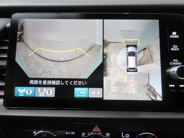 フィット ｅ：ＨＥＶホーム　当社デモカー　純正ドラレコ　メモリーナビ　ＥＴＣ　ＨｏｎｄａＳＥＮＳＩＮＧ　Ｂｌｕｅｔｏｏｔｈ　革巻ステアリング　前後誤発進抑制機能　クリソナ　マルチビュー　助手席エアバッグ　運転席エアバッグ　ＡＣＣ（4枚目）