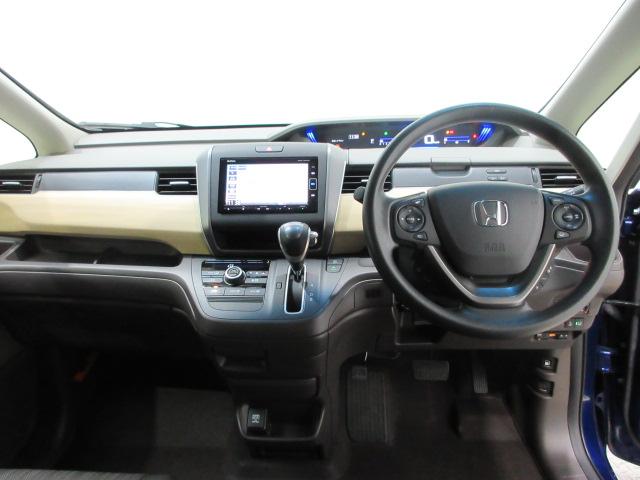 フリード G・ホンダセンシング 6人 メモリーナビ リアカメラ Bluetooth ETC 両側電動スライドドア LEDヘッドライト フロントハーフシェード ドアバイザー ワンオーナー Fセグ 追突被害軽減ブレーキ iストップ 禁煙(14枚目)