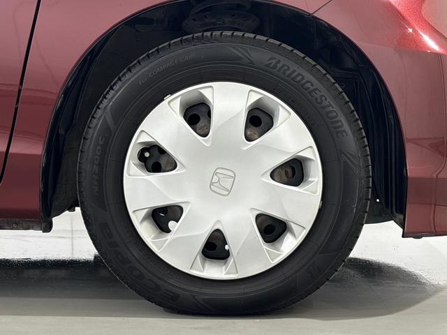 フリード Ｇジャストセレクション　純正メモリーナビ　ワンセグＴＶ　バックカメラ　スマートキー　左側パワースライドドア　ディスチャージヘッドライト　ＥＴＣ　ベンチシート　Ｂｌｕｅｔｏｏｔｈ対応　Ｂモニター　スマトキー　定期点検記録簿（14枚目）