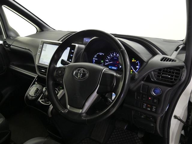 ヴォクシー ハイブリッドＺＳ　煌ＩＩＩ　フルセグ　メモリーナビ　後席モニター　バックカメラ　衝突被害軽減システム　ＥＴＣ　両側電動スライド　ＬＥＤヘッドランプ　３列シート　ワンオーナー　ＤＶＤ再生　ミュージックプレイヤー接続可　記録簿　ＣＤ（3枚目）