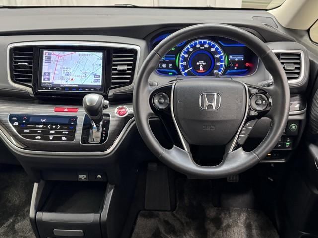 オデッセイハイブリッド ハイブリッドアブソルート・ホンダセンシング アルミ サイドカーテンエアバック リアカメラ Pシート フルオートエアコン デュアルエアコン ABS 整備記録簿 キーレス VSA Wエアバッグ LEDライト 3列シート パワーウィンドウ ナビTV(4枚目)