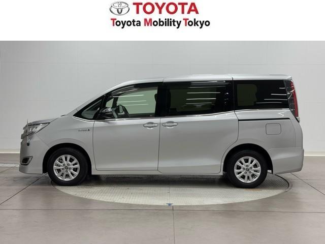 ノア ハイブリッドG Rカメラ スマートキー&プッシュスタート LEDへッドライト 地デジ イモビライザー 記録簿有 Wエアコン パワーウインドウ アルミ クルコン エアバッグ 横滑り防止 DVD再生機能 フルフラット(3枚目)