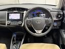 カローラアクシオ ハイブリッドＧ　キーレスキー　ＥＴＣ車載器　ＡＵＸ　ナビＴＶ　カーテンエアバッグ　助手席エアバッグ　パワーウィンドウ　盗難防止システム　バックモニター　定期点検記録簿　ＡＢＳ　横滑り防止　パワーステアリング　ワンセグ（4枚目）