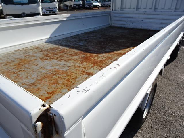 アトラストラック ロングスーパーロー 1.5t積載10尺平ボディ 2.0ガソリン 5MT ABS エアバッグ リヤWタイヤ 電動格納ミラー CBF-SQ2F24(52枚目)