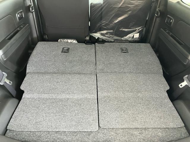 ワゴンＲ ＦＸ　衝突被害軽減システム　誤発進抑制装置　スマートキー　ハロゲンランプ　電動格納ミラー　運転席シートヒーター　オートエアコン　オートライト　助手席下収納ＢＯＸ　後部座席傘ホルダー　ホイールキャップ（64枚目）