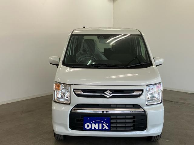 ワゴンＲ ＦＸ　衝突被害軽減システム　誤発進抑制装置　スマートキー　ハロゲンランプ　電動格納ミラー　運転席シートヒーター　オートエアコン　オートライト　助手席下収納ＢＯＸ　後部座席傘ホルダー　ホイールキャップ（4枚目）