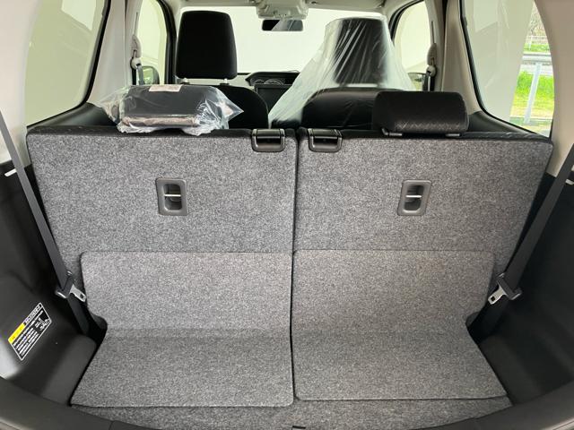 ワゴンＲ ＦＸ　衝突被害軽減システム　誤発進抑制装置　スマートキー　ハロゲンランプ　電動格納ミラー　運転席シートヒーター　オートエアコン　オートライト　助手席下収納ＢＯＸ　後部座席傘ホルダー　ホイールキャップ（56枚目）