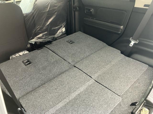 ワゴンＲ ＦＸ　衝突被害軽減システム　誤発進抑制装置　スマートキー　ハロゲンランプ　電動格納ミラー　運転席シートヒーター　オートエアコン　オートライト　助手席下収納ＢＯＸ　後部座席傘ホルダー　ホイールキャップ（64枚目）