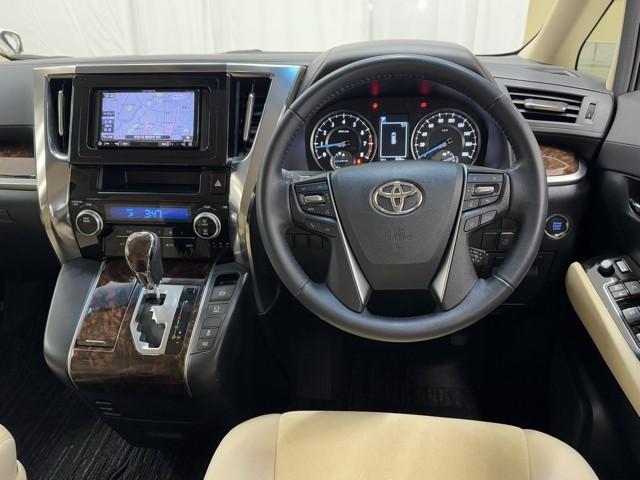 ヴェルファイア 2.5X ワンセグ LEDヘッドライト クルーズコントロール フルフラット AUX ETC 横滑り防止装置 記録簿 3列シート 盗難防止装置 オ-トエアコン メモリーナビ アルミホイール Wエアコン ABS(4枚目)