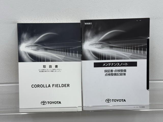 カローラフィールダー ハイブリッド　ＥＸ　衝突軽減　地デジＴＶ　スマートキー＆プッシュスタート　サイドエアバック　ドラレコ　アイドリングストップ　オートエアコン　横滑り防止装置　ナビＴＶ　ＥＴＣ　キーレス　メモリーナビ　記録簿　ＤＶＤ再生（20枚目）