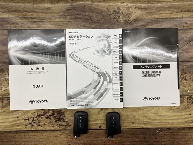 ノア ハイブリッドＧ　Ｒカメラ　スマートキー＆プッシュスタート　ＬＥＤへッドライト　地デジ　イモビライザー　記録簿有　Ｗエアコン　パワーウインドウ　アルミ　クルコン　エアバッグ　横滑り防止　ＤＶＤ再生機能　パワステ　ＡＢＳ（20枚目）