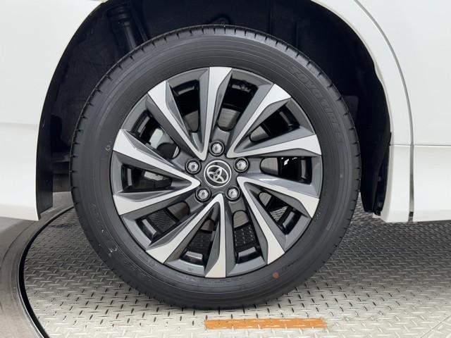 ヴォクシー ハイブリッドS-Z パワーウィンドウ DVD再生機能 インテリキー 横滑防止装置 地デジTV アクティブクルーズコントロール フルオートエアコン リアカメラ エアバッグ ABS 100V充電 ナビTV WAC キーレス(18枚目)