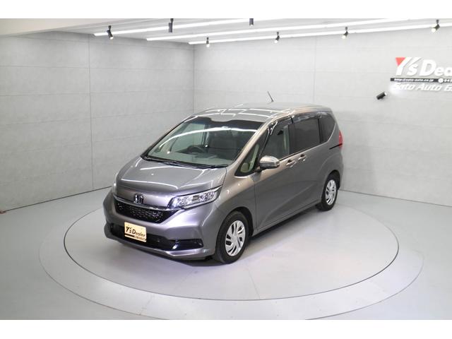 フリード Ｇ・ホンダセンシング　純正ナビ　バックカメラ　両側パワースライドドア　ＥＴＣ　フルセグＴＶ　ドライブレコーダー　Ｂｌｕｅｔｏｏｔｈ接続　コーナーセンサー　スマートキー　衝突被害軽減ブレーキ　ＤＶＤ再生　ＵＳＢ充電（9枚目）