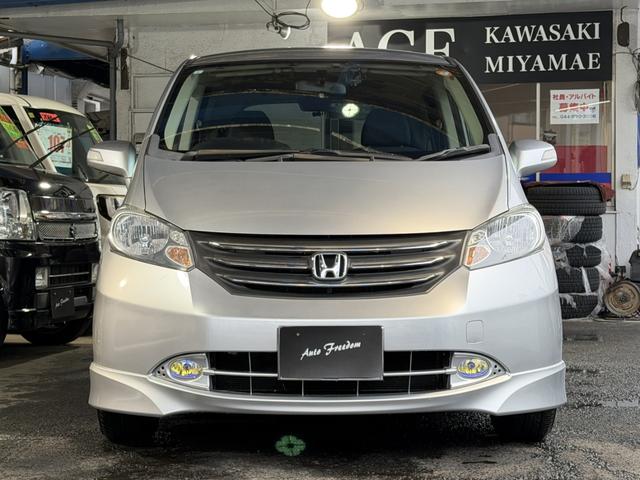 フリード Ｇ　エアロ　Ｌパッケージ　ワンオ－ナ－車７人乗パワ－スライドドア・社外Ｂｌｕｅｔｏｏｔｈ付ナビ地デジ・ＨＤＭＩ・バックカメラ・ＤＶＤ再生・ＨＩＤライト＆フォグライト・純正エアロ・キ－レスキ－・記録簿（8枚目）