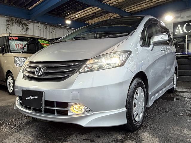 フリード Ｇ　エアロ　Ｌパッケージ　ワンオ－ナ－車７人乗パワ－スライドドア・社外Ｂｌｕｅｔｏｏｔｈ付ナビ地デジ・ＨＤＭＩ・バックカメラ・ＤＶＤ再生・ＨＩＤライト＆フォグライト・純正エアロ・キ－レスキ－・記録簿（11枚目）