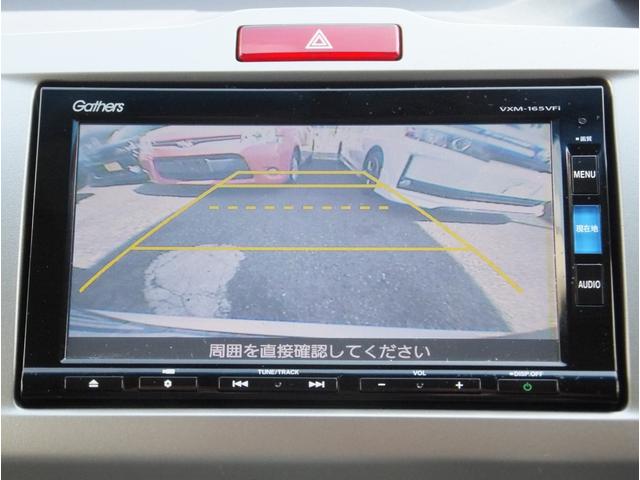 フリードハイブリッド ハイブリッド　プレミアムエディション　純正ナビ／フリップダウンモニター／ＣＤ／ＤＶＤ／フルセグ／Ｂｌｕｅｔｏｏｔｈオーディオ／Ｂカメラ／ＥＴＣ／クルーズコントロール／両側自動ドア／ハーフレザー／スマートキー／ＨＩＤライト／フォグ／（23枚目）