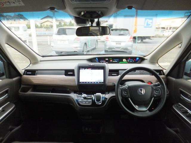 フリード+ハイブリッド ハイブリッドG・ホンダセンシング ホンダセンシング/純正9型ナビ/CD/DVD/フルセグ/Bluetooth/ETC/Bカメラ/前後ドラレコ/両自動/クルコン/LEDライト/シートヒーター/社外アルミ/ルーフラック/ワンオーナー/(3枚目)