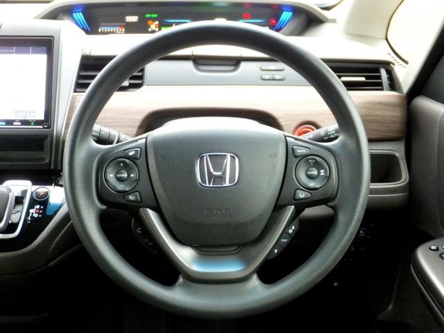 フリード+ハイブリッド ハイブリッドG・ホンダセンシング ホンダセンシング/純正9型ナビ/CD/DVD/フルセグ/Bluetooth/ETC/Bカメラ/前後ドラレコ/両自動/クルコン/LEDライト/シートヒーター/社外アルミ/ルーフラック/ワンオーナー/(4枚目)