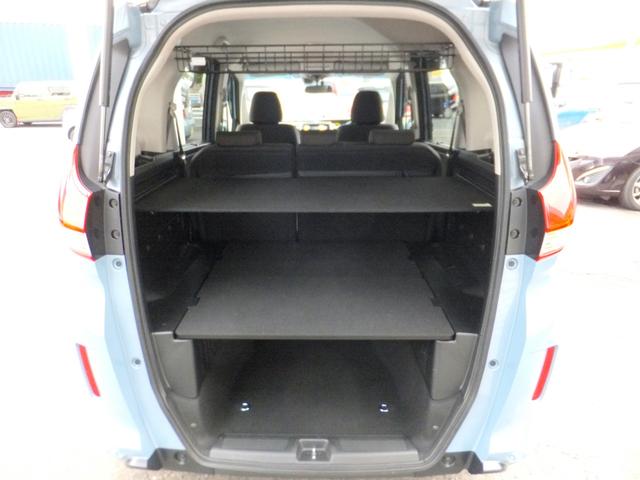フリード+ハイブリッド ハイブリッドG・ホンダセンシング ホンダセンシング/純正9型ナビ/CD/DVD/フルセグ/Bluetooth/ETC/Bカメラ/前後ドラレコ/両自動/クルコン/LEDライト/シートヒーター/社外アルミ/ルーフラック/ワンオーナー/(49枚目)