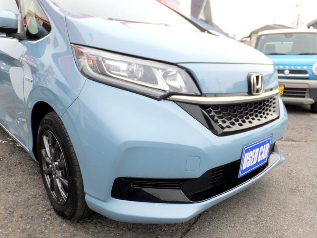 フリード+ハイブリッド ハイブリッドG・ホンダセンシング ホンダセンシング/純正9型ナビ/CD/DVD/フルセグ/Bluetooth/ETC/Bカメラ/前後ドラレコ/両自動/クルコン/LEDライト/シートヒーター/社外アルミ/ルーフラック/ワンオーナー/(70枚目)