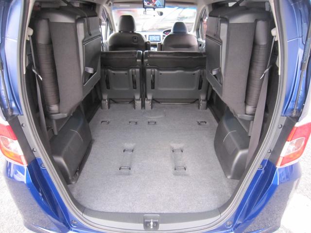 フリード G プレミアムエディション 社外ナビ/CD/DVD/フルセグ/Bluetooth/ETC/後席フリップダウンモニター/Bカメラ/両側自動ドア/ハーフレザー/スマートキー/クルーズコントロール/HIDライト/(11枚目)