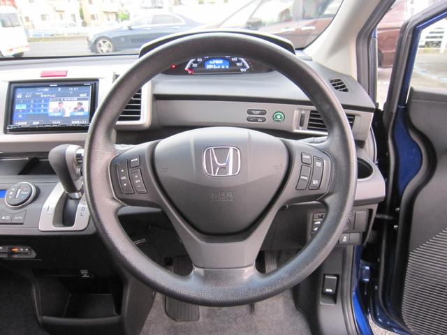 フリード G プレミアムエディション 社外ナビ/CD/DVD/フルセグ/Bluetooth/ETC/後席フリップダウンモニター/Bカメラ/両側自動ドア/ハーフレザー/スマートキー/クルーズコントロール/HIDライト/(18枚目)