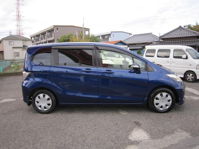 フリード G プレミアムエディション 社外ナビ/CD/DVD/フルセグ/Bluetooth/ETC/後席フリップダウンモニター/Bカメラ/両側自動ドア/ハーフレザー/スマートキー/クルーズコントロール/HIDライト/(53枚目)