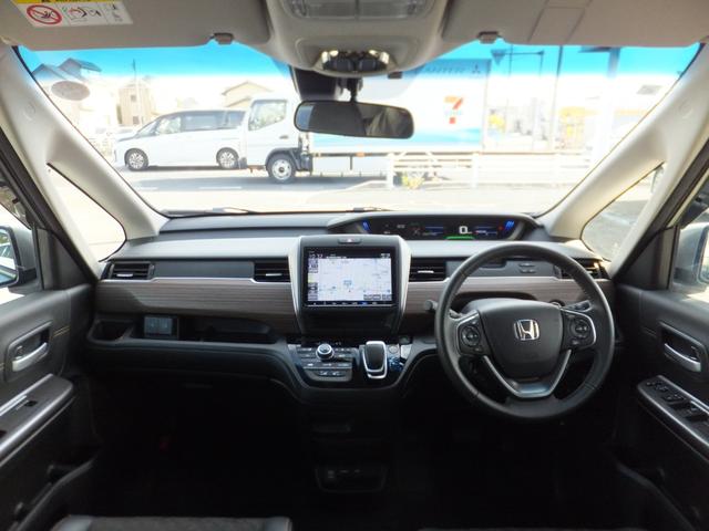 フリード+ハイブリッド ハイブリッド・クロスター 純正9型ナビ/純正15.6型フリップM/CD/DVD/フルセグ/Bluetooth/ETC/Bカメラ/ルーフラック/クルコン/シートヒーター/両自動/LEDライト/LEDフォグ/ルーフレール/Hレザー(3枚目)