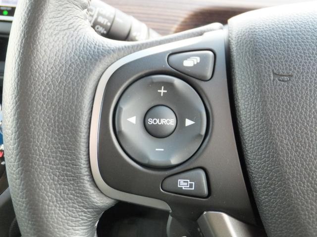 フリード+ハイブリッド ハイブリッド・クロスター 純正9型ナビ/純正15.6型フリップM/CD/DVD/フルセグ/Bluetooth/ETC/Bカメラ/ルーフラック/クルコン/シートヒーター/両自動/LEDライト/LEDフォグ/ルーフレール/Hレザー(4枚目)